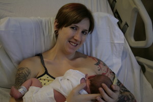 Kim breastfeeding Amelia for first time